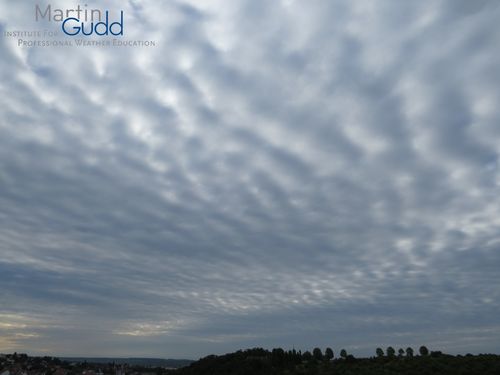 Altocumulus opacus perlucidus undulatus